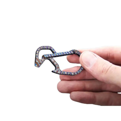 a hand holding CIVIVI Click Carabiner Titanium Flamed